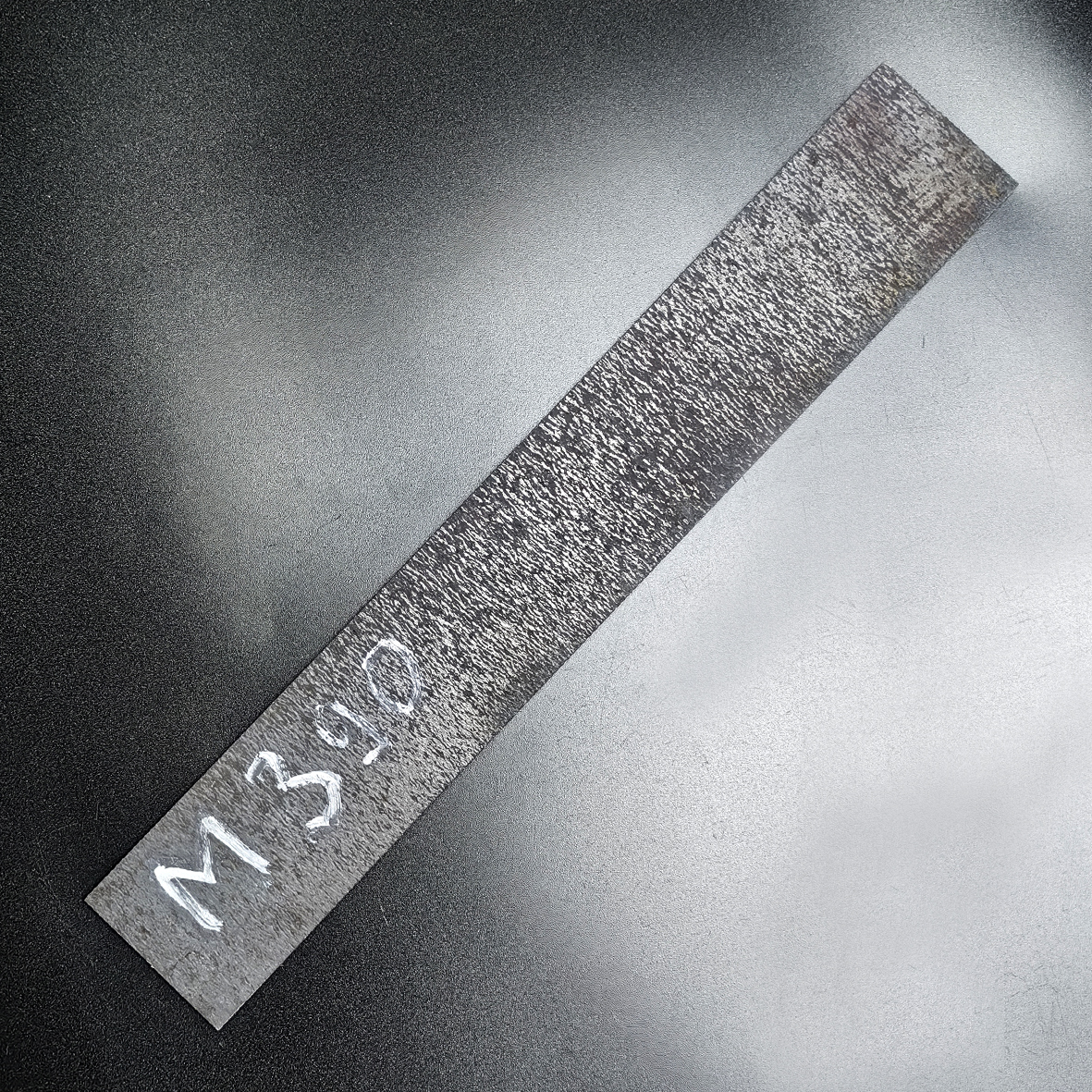 Заготовка для ножа из стали М-390 размеры: 200х40х2,3 мм